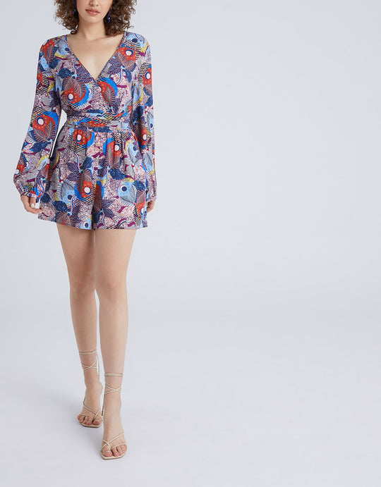 리브스 프린트 러플 밑단 랩 블라우스