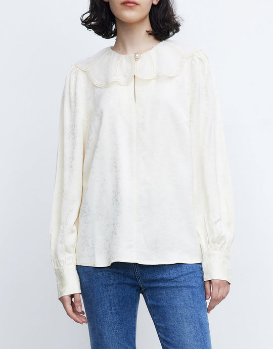 스테이트먼트 칼라 블라우스